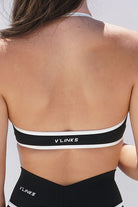 חזיית ספורט Mini Bra Contrast לנשים עם פסי קונטרסט לבנים, גב פתוח, קאפים נשלפים ובד FLOW מחטב ונושם מבית VLINKS